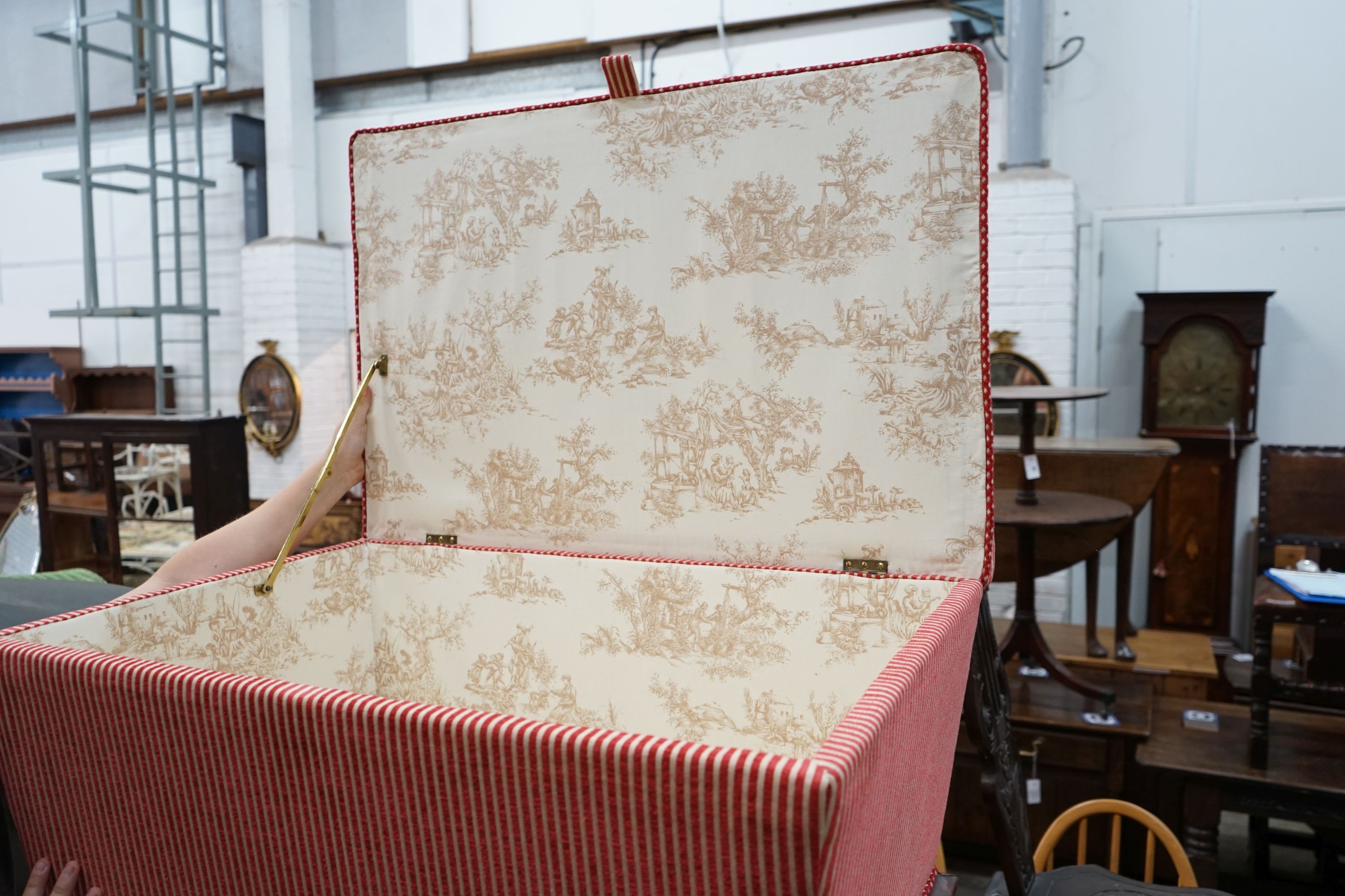 A Victorian rosewood ottoman, recently re-upholstered, width 83cm, depth 53cm, height 50cm